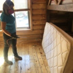 Bed Bug Exterminator at work - Legacy Pest Control Wyoming